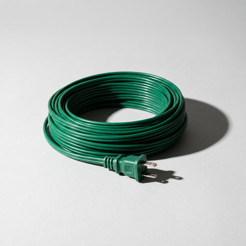 Coil of green outdoor lead wire with male plug
